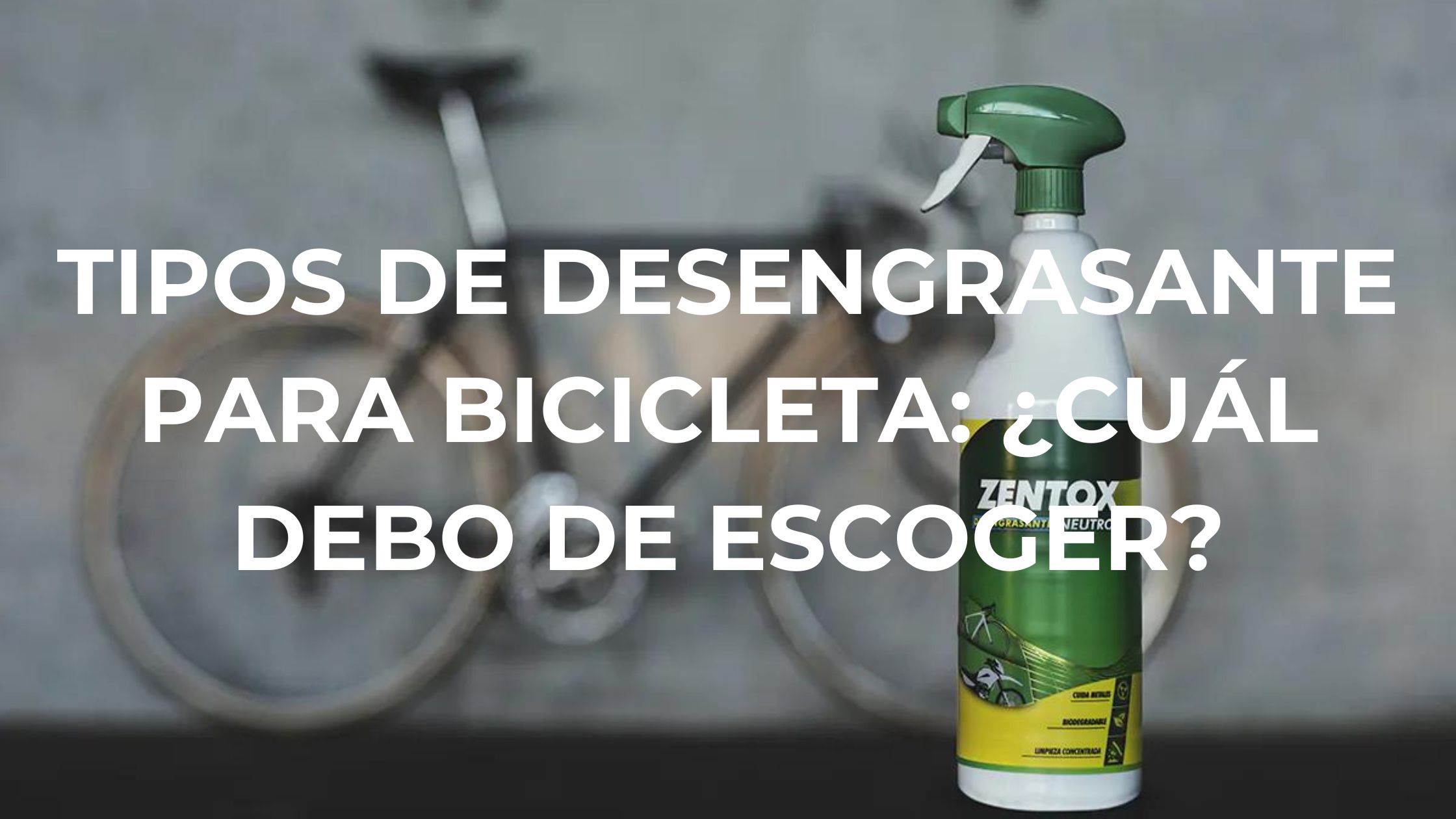 Botella de Zentox Desengrasante Neutro con una bicicleta de fondo apoyada en un muro de hormigón gris