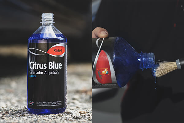 Sisbrill Citrus Blue Eliminador de Alquitrán Byphasse de 1 Litro siendo aplicado en la pintura de un coche oscuro para eliminar el alquitrán